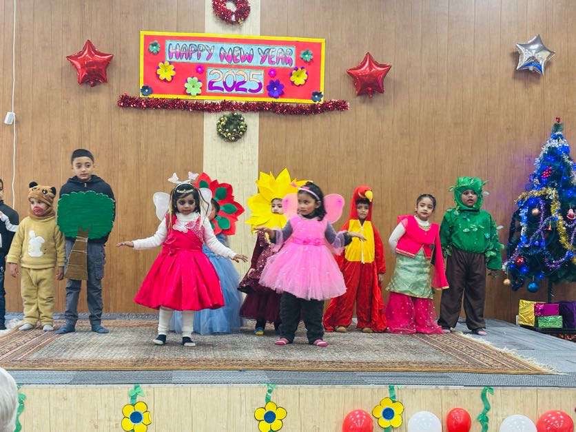 Children performing in colourful costumes on the school stage