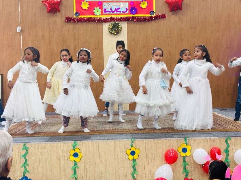 Students performing a dance at a school function